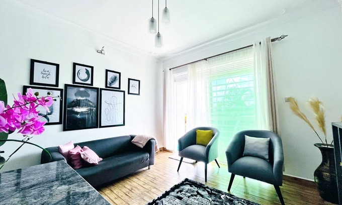 Kireka Apartment | Apartment unit - White House with rental car.