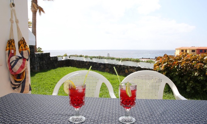 Brena Baja Apartment | Apartment with stunning views of the sea, garden, pool and free Wi-Fi.
