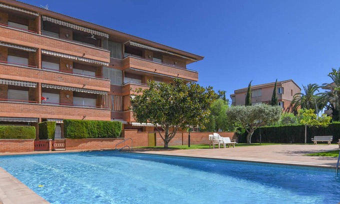 Comarruga Apartment | Apartment with terrace and communal pool