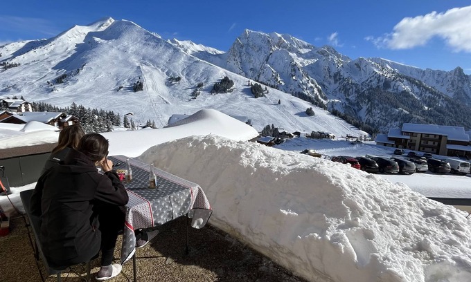 Manigod Apartment | Apartment with terrace, panoramic view and skis at your feet