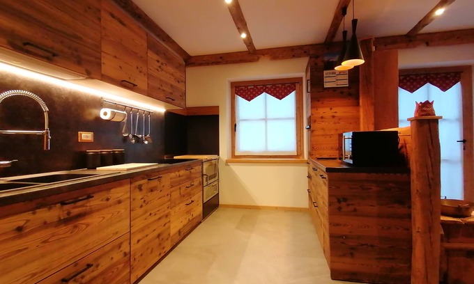 Vermiglio Apartment | Appartamento Deluxe in legno situato in montagna con sauna e giardino
