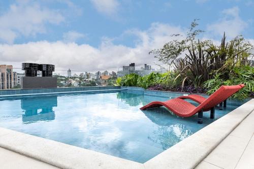Bigorrilho Apartment | Apto Luxo 1Q Varanda, Piscina, Academia e Garagem