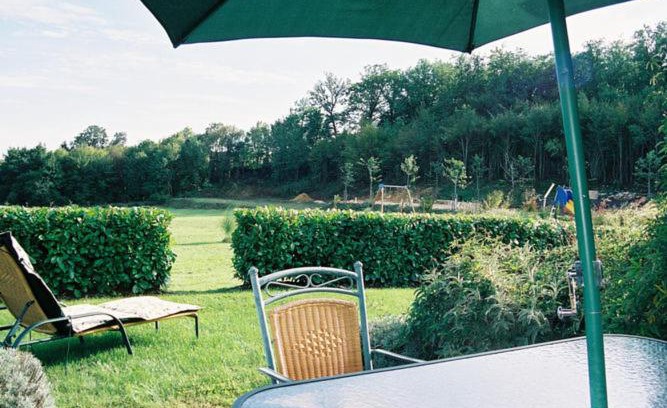 Castelnaud-la-Chapelle House | Attached house with garden for 2 people and a baby in a small scale park