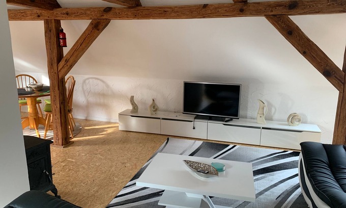 Wendisch Waren Apartment | Attic apartment Muttis Stübchen - two-room vacation apartment with eat-in kitchen