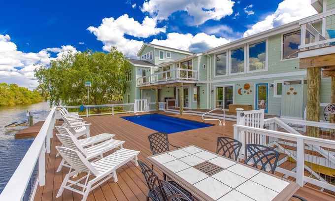 Sandbridge House | Attractive canal-front home w/private pool, WiFi, washer/dryer, central AC, deck