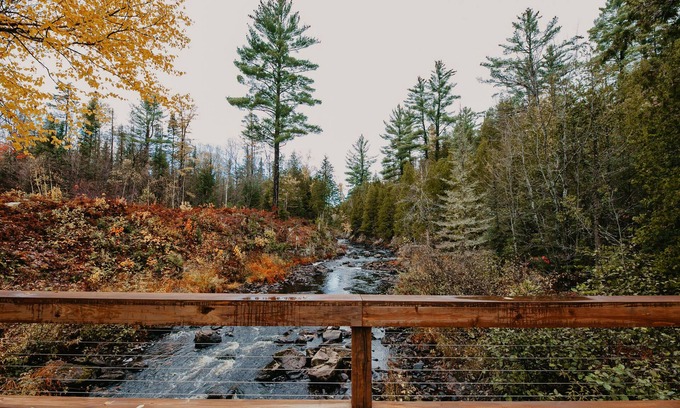 Champion House | ATV-Snowmobile Trail, Large home, sits on the peshekee river. sleeps 18 people.