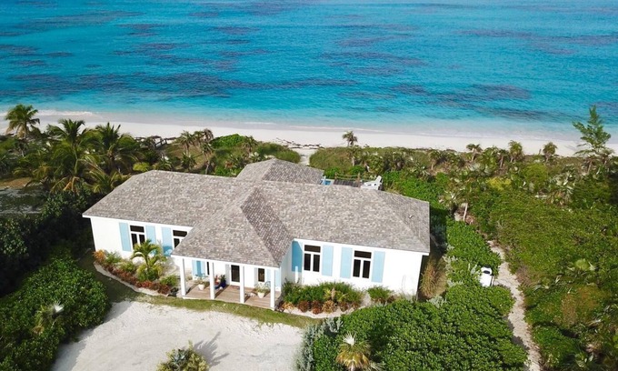North Palmetto Point House | AZURE: Banks Rd Luxury Beachfront Home with heated pool & backup generator.
