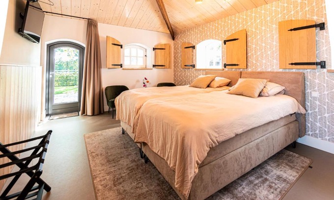 Melderslo Bed & Breakfast | B&B De NieuwenHof 'De Tuinkamer'