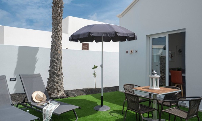 Charco del Palo House | B1, in a small complex with communal heated pool 100m from the sea