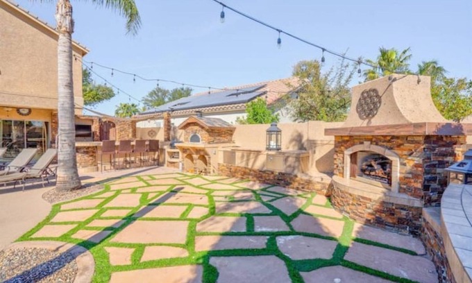 Cottonflower House | Backyard Dream: Pool, Putting Green & Pizza Oven