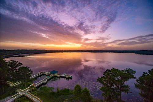 Florida Central Atlantic Coast Apartment | Balcony King Suite - Lake & Pool view