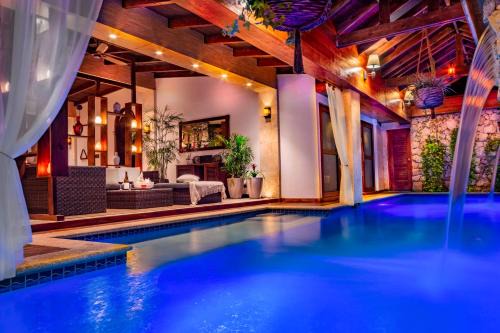 Noord House | Bali Retreat Aruba -2 Pools,Cinema,Yoga,Cave