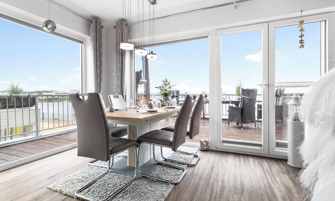 Olpenitz Apartment | Baltic Sea vacation apartment "HafenLounge" directly on the water with wellness bath & dream view
