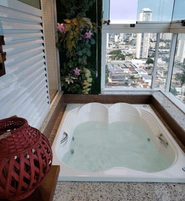 Setor Bueno Apartment | Banho de Lua - Jacuzzi com vista p/Pq. Vaca Brava