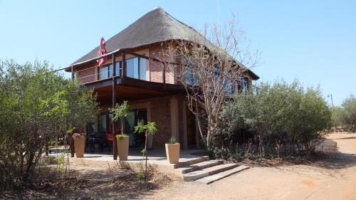 Tshwane Resort | Baobab - NUDE - SunEden Family Naturist Resort