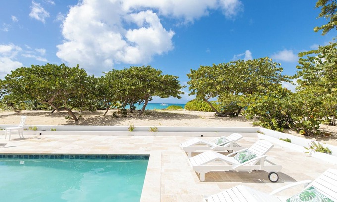 Plum Bay Cottage | Barefoot Beach Bungalow