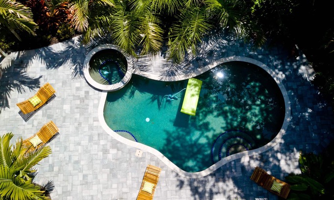River District House | Barefoot Bungalow, Heated Pool & Spa, Game Room Foosball