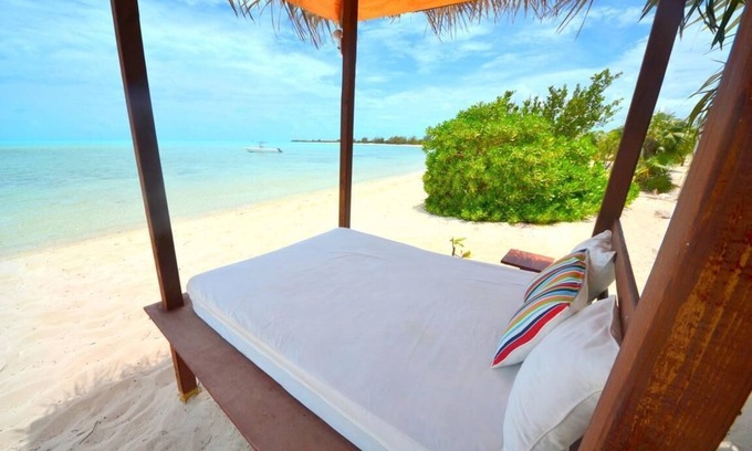 Leeward Settlement Cottage | Barefoot Luxury – Silver Palms Cottage # 1, Beachfront with Pool on Long Bay