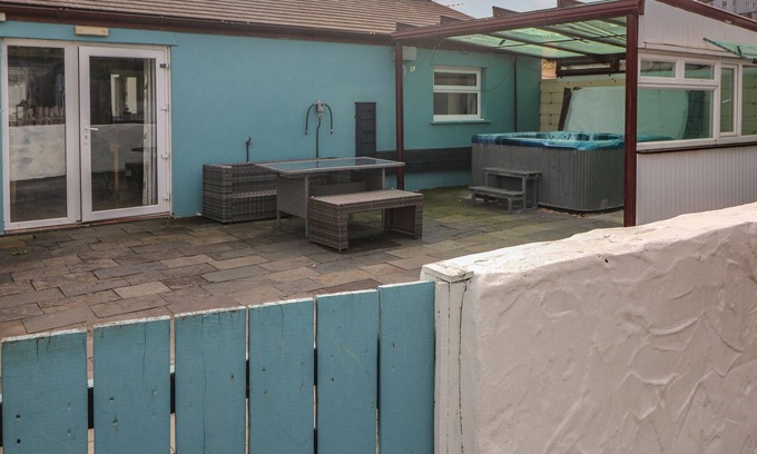 Llanybri Cottage | BARN COTTAGE, pet friendly, with hot tub in Laugharne