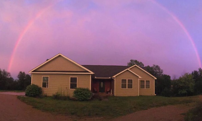 Grass Lake Apartment | Basement Bedroom Suite in the country with Hot Tub