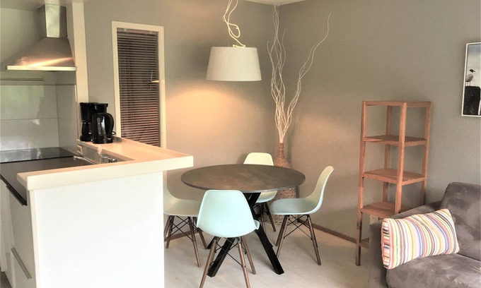 Hollum Apartment | Beach 1 km, on site resort with covered swimming pool, playground, tennis