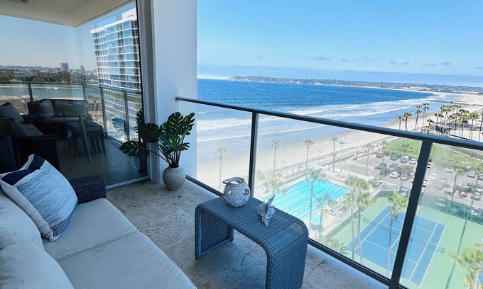 Coronado Condo | Beach and city views in condo with backyard access to beach and walkable town.