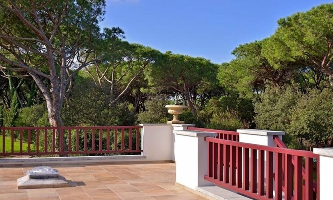 Marina di Bibbona Villa | Beach front Casa Rossa, a modern seaside villa, surrounded by a beautiful garden with lawn and r.