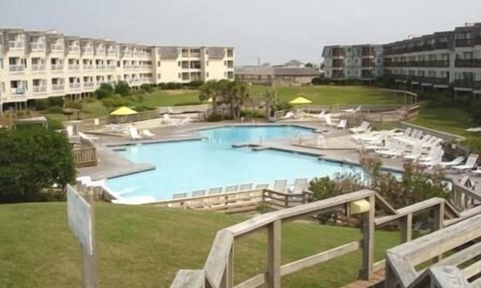 Morehead City Condo | Beach Front Resort w/150' Water slide, Free Mini Golf, Indoor Pool, Tennis,more