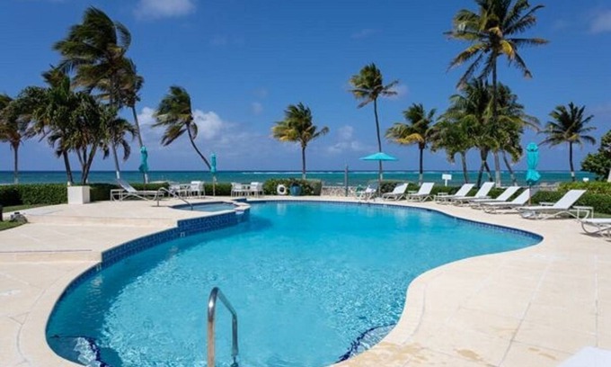 West Bay Condo | Beach front unit 2 bedroom/2 bath - steps to the beach or pool! Sleeps 5.