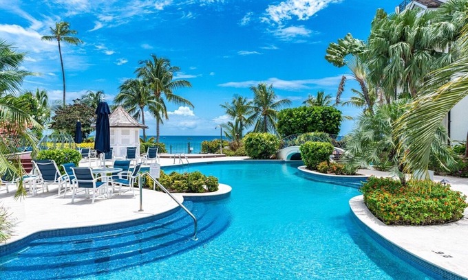 Schooner Bay Apartment | "Beach Happy" Beachfront Apartment by One Caribbean Estates