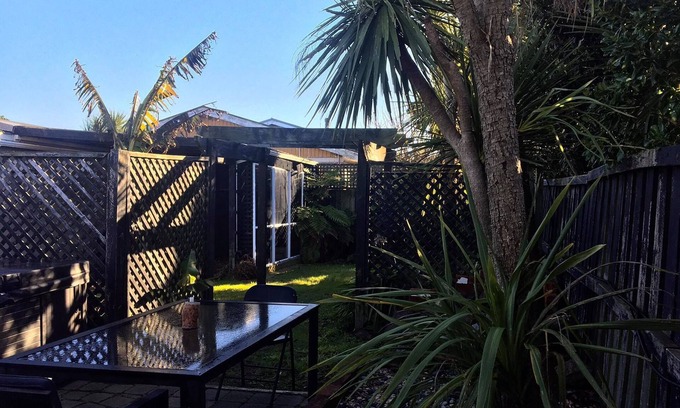 Christchurch House | Beach House with Port Hills and Estuary Views