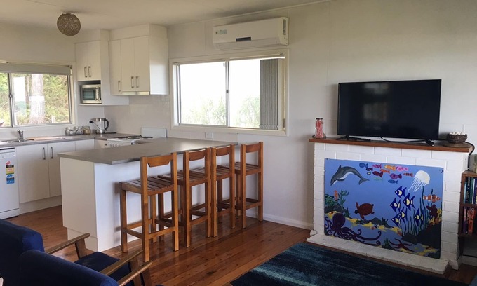 Long Beach House | Beach Side Cabin - neat and tidy with Uninterrupted views of the Bay