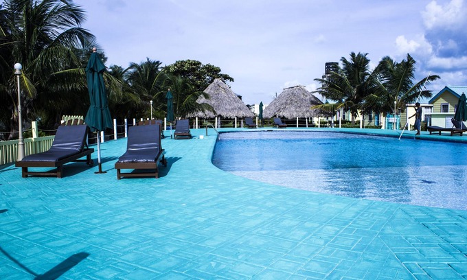 San Pedro Cottage | Beach side cottage on Private beach with freshwater pool, "coconut"- RCB