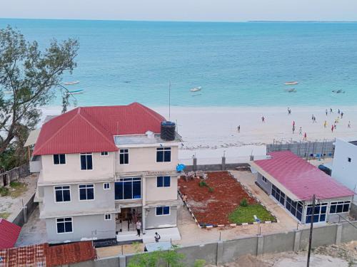 Uroa Apartment | Beachfront Bliss 2BR Master Suites with Balcony, AC Free WiFi Uroa Zanzibar