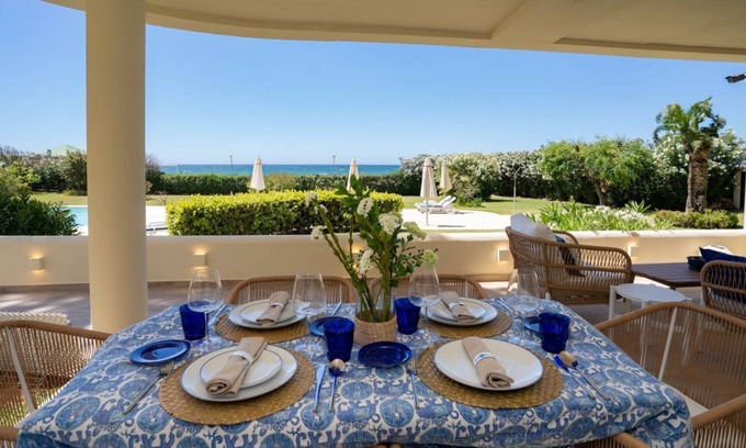 Nikki Beach Apartment | Beachfront complex Neptuno II, sea view, pool and garden, Elviria.
