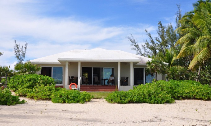 Governor's Harbour House | Beachfront Dock TikiHut WiFi Kayaks Paddleboards Terrace Gardens Private
