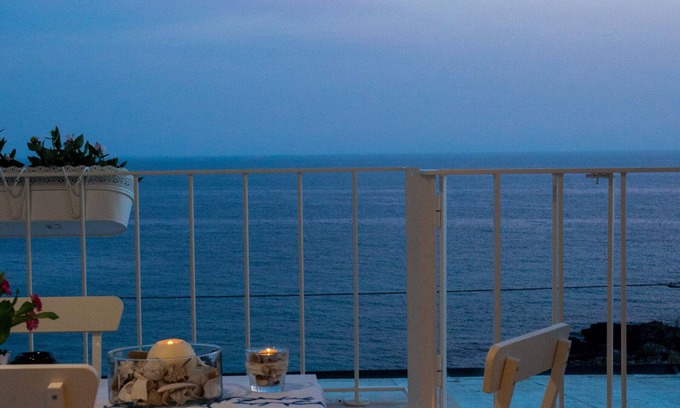 Torre San Giovanni Apartment | Beachfront 2nd floor apartment with terrace located east with sunset