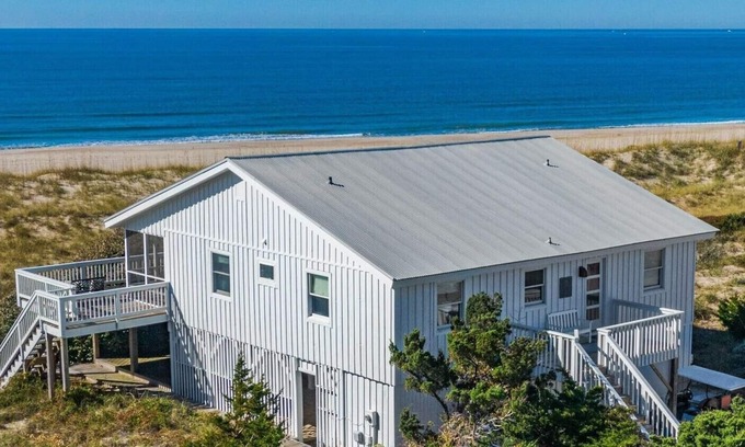 South Beach House | Beachfront Oasis a Classic Carolina cottage Striking Ocean Views Pet Friendly