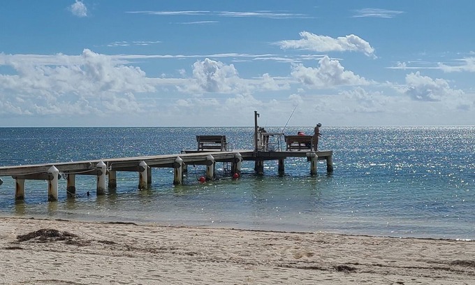 Florida Keys House | Beachfront townhome. Steps to the beach, dock, pool, and tennis w/pickle ball.