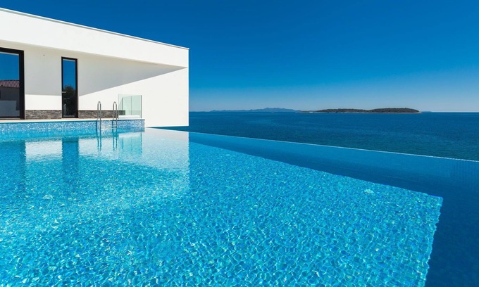 Potirna Villa | Beachfront Villa Blue Heaven with Pool