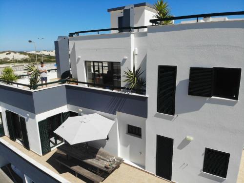 Vagos Bed & Breakfast | Beachhaus Slide