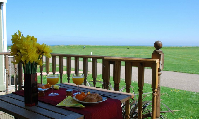 Bacton Ski Chalet | Beachscape, contemporary home, views across to the sea, dog friendly, free wifi