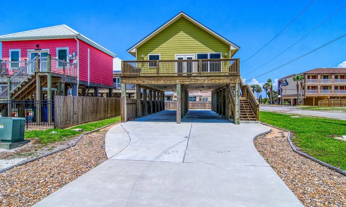 North Beach House | Beachside home with huge deck just steps from the sand - minutes to city