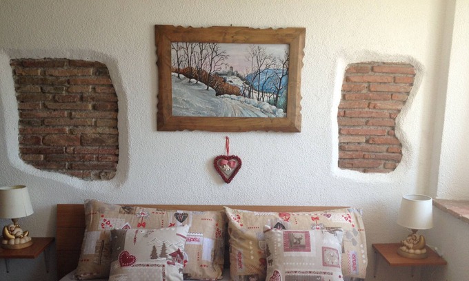Santa Giustina Apartment | Beautiful Studio "SoleLuna" with garden and views of the Dolomites