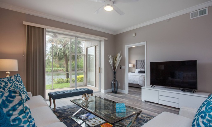 Naples Heritage Condo | Beautiful 1st. floor unit totally renovated with lake view!