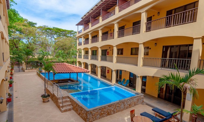 Coco Condo | Beautiful 2 bedroom condo walking distance to the beach