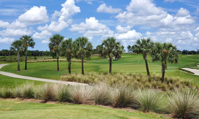 Lakewood Ranch Condo | Beautiful 2nd Floor Coach Home at Lakewood National with West Facing Lanai View