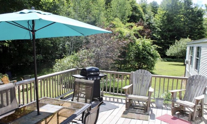 Central Lake House | Beautiful and clean mobile home.Enjoy beautiful Torch Lake, boating, fishing,xx