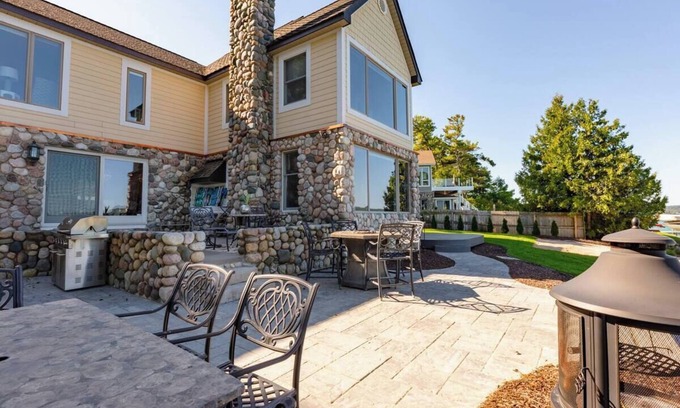 Suttons Bay House | Beautiful Beach Front on Suttons Bay with Sunset Views.