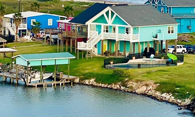 Cedar Lane House | Beautiful beach house boasts a scenic water view from its front and back doors.